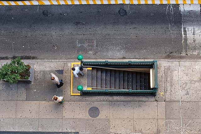 a view from above. Looking dow at a typical NY subway entrance/exit